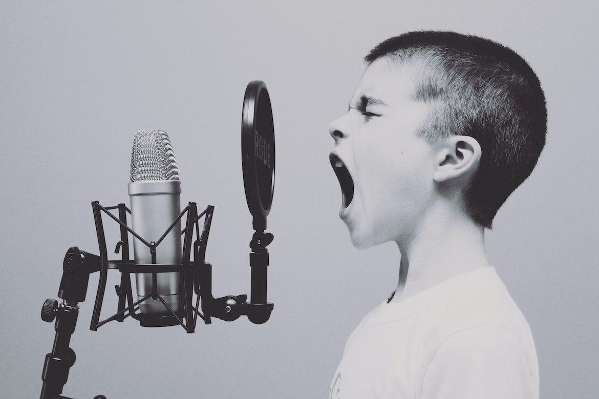 Boy using his voice