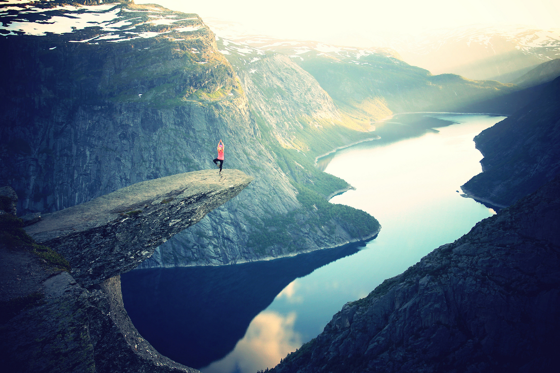 girl-balancing-high-ledge